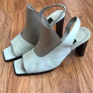 White open-toe leather heels